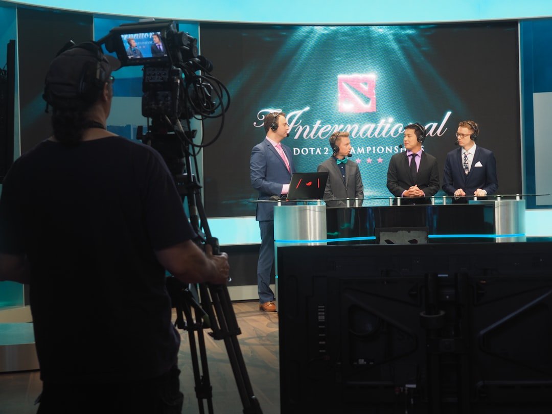 services-01 three-men-in-suits-being-filmed-for-dota-2-competition-yehv9k3ynx8